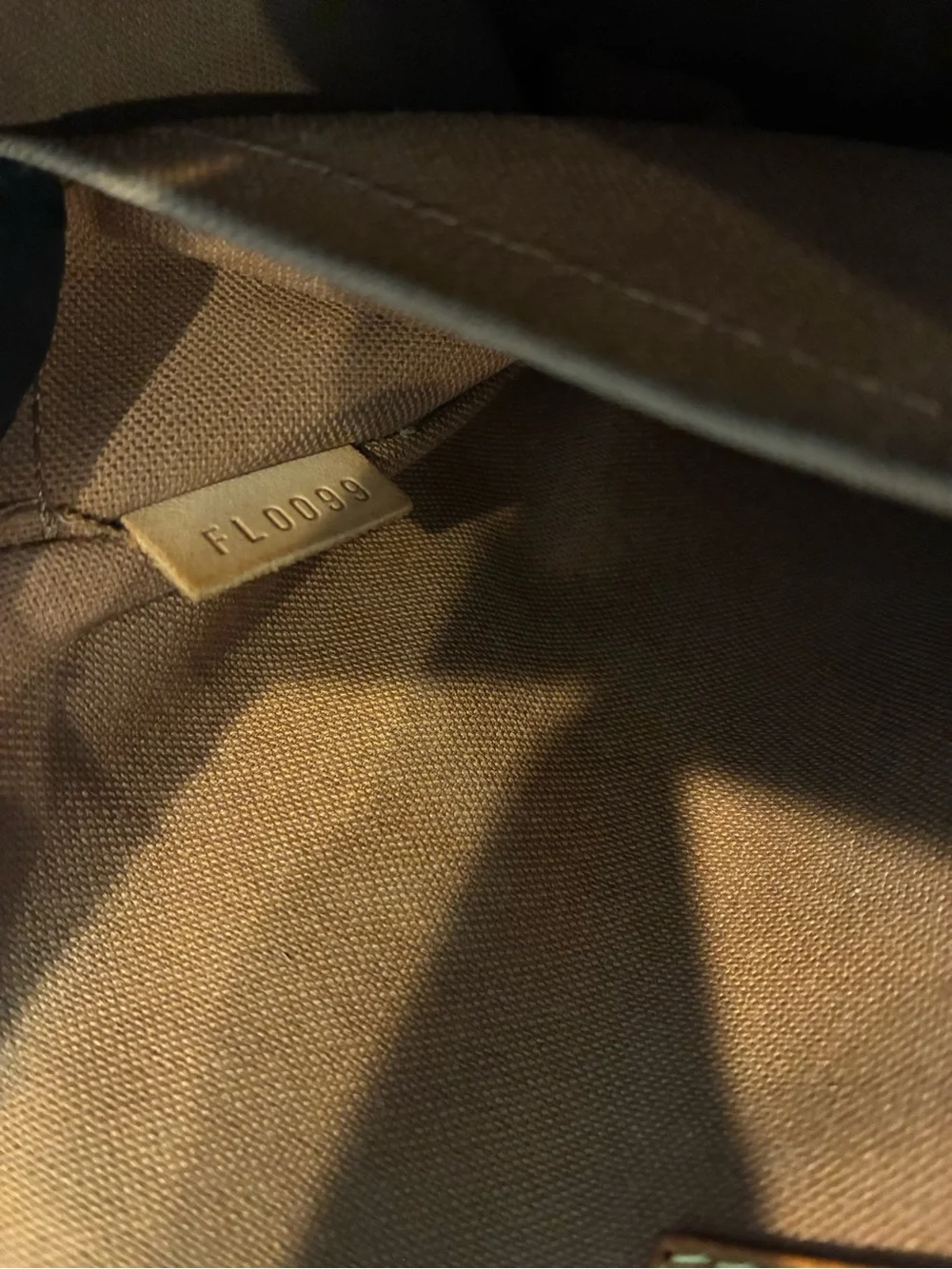 LOUIS VUITTON POPINCOURT HANDBAG.